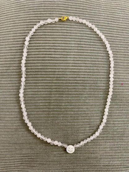 PEACHY & WILD WHITE QUARTZ SMILEY FACE NECKLACE